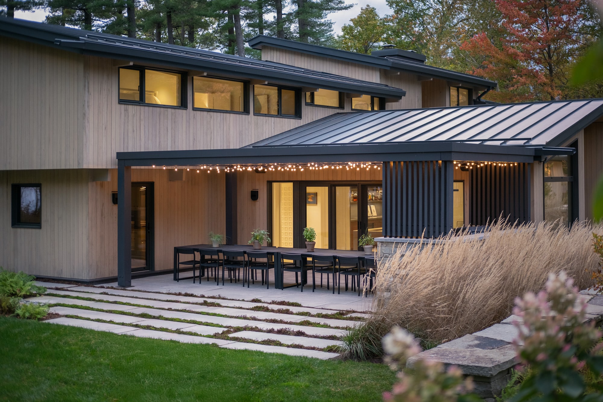 Outside BBQ and dinning area with stone and wood trellis