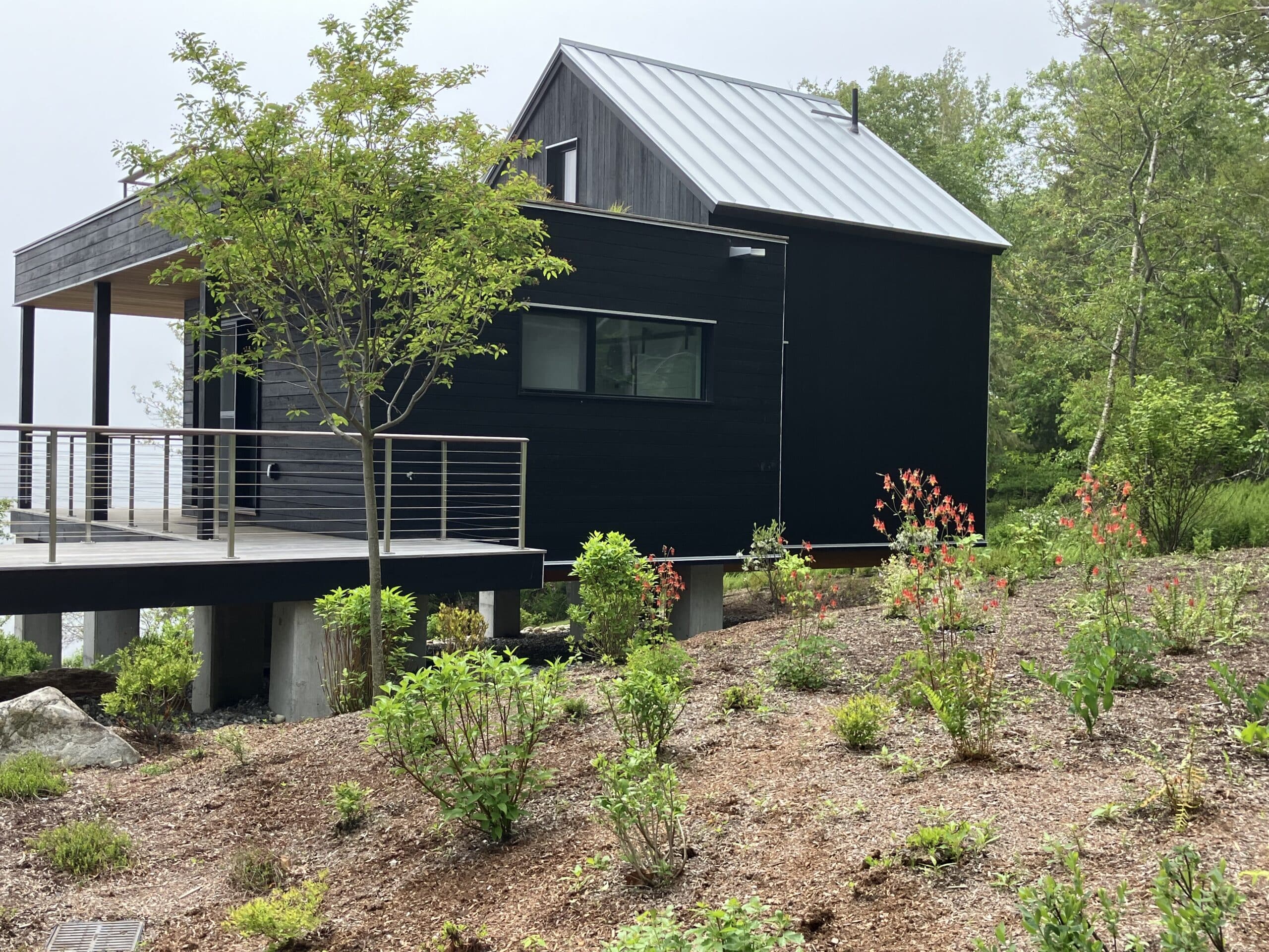 Guest house on the ocean in Maine. It sits on concrete piers to keep it out of the flood plain.